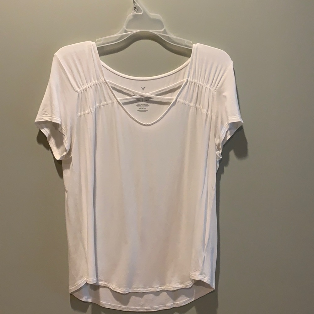 white soft and sexy top that crosses in the front